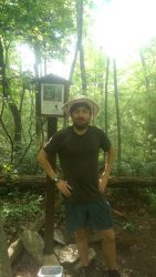 Alan stands at the half-way marker for the Appalachian Trail