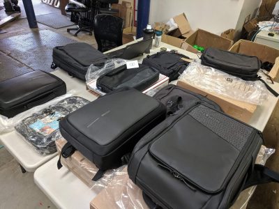 In order to determine which backpack would be ideal for carrying the mobile workstations, Alan purchased 10 different backpacks to test them. He settled on the Amazon Slim Basics bag, despite not being a fan of the company.