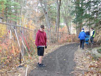 After the RAP (recycled asphalt) was placed, graders were used to smooth the path.