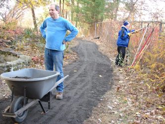 After the RAP (recycled asphalt) was placed, graders were used to smooth the path.