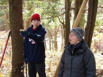 Alan directs adult leaders on where to prioritize efforts during his Eagle Scout project in 2012.