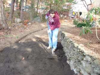 After the RAP (recycled asphalt) was placed, graders were used to smooth the path.
